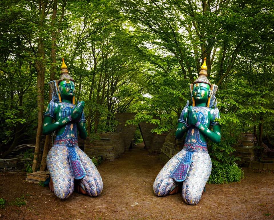 Thephanom temple protector as festival decoration – spiritual atmosphere bringer with Añjali Mudrā hand gesture.